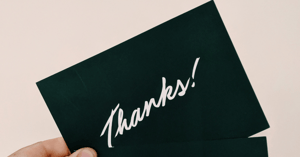 A black card saying Thanks