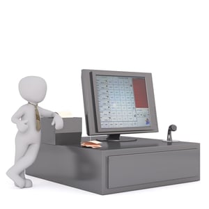 An animated man standing next to a till system with a screen and cash draw