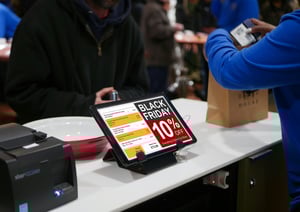 An Epos till on a table with black Friday offer on it and showing the customers order 